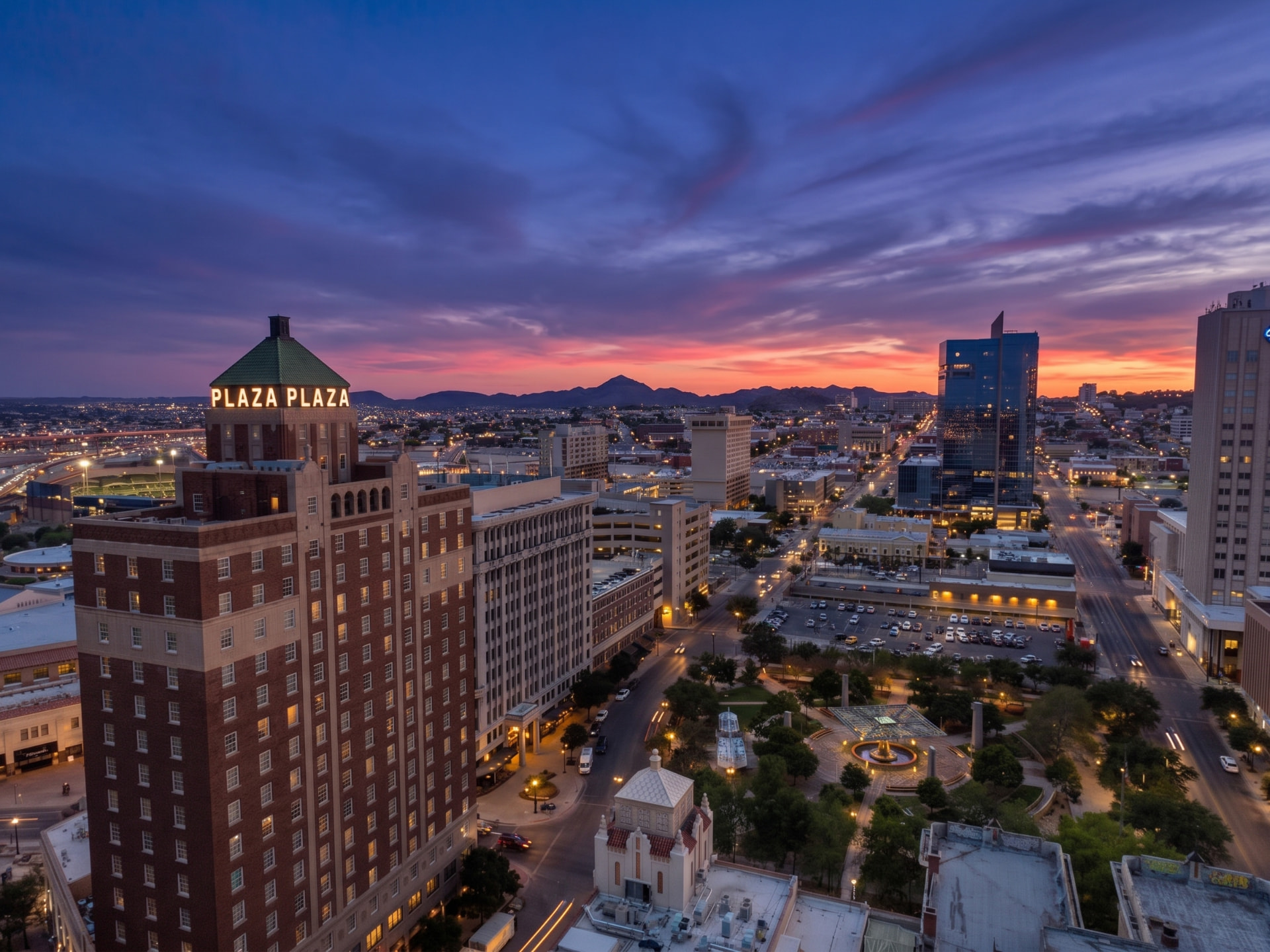 Downtown El Paso skyline at sunset with the Plaza Hotel and Franklin Mountains